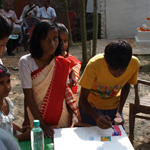 Children and adults participate in the workshop